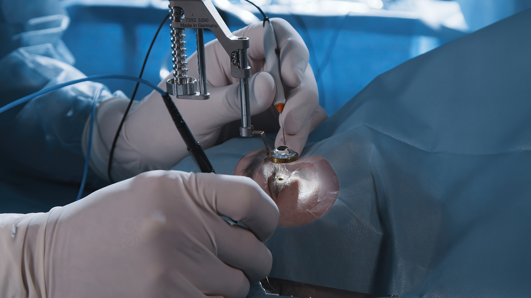 Patient undergoing refractive eye surgery with an eye specialist.
